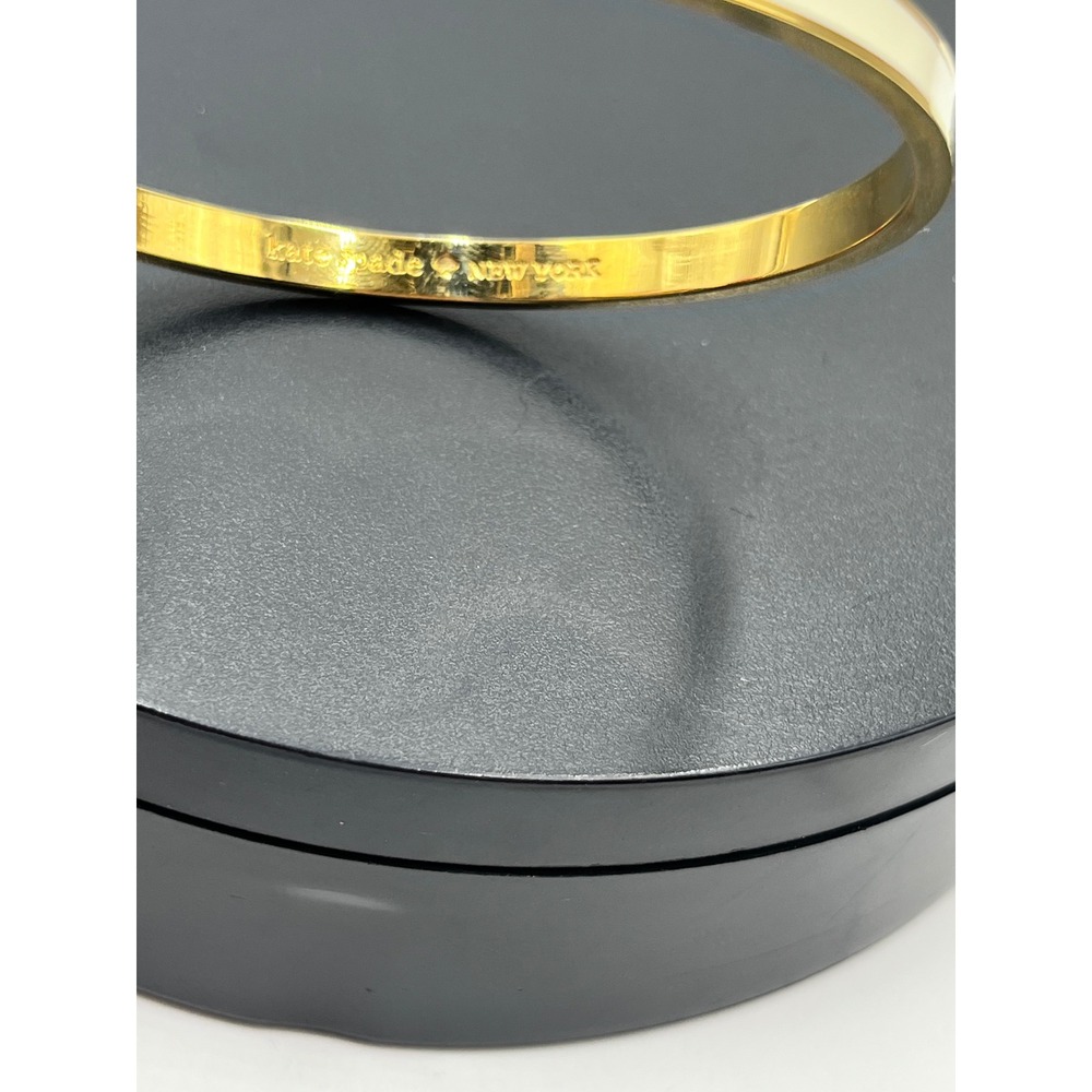 Kate Spade NY Tickle the Ivories Ivory
Enamel 12k gold-plate Bangle Bracelet - Picture 8 of 12